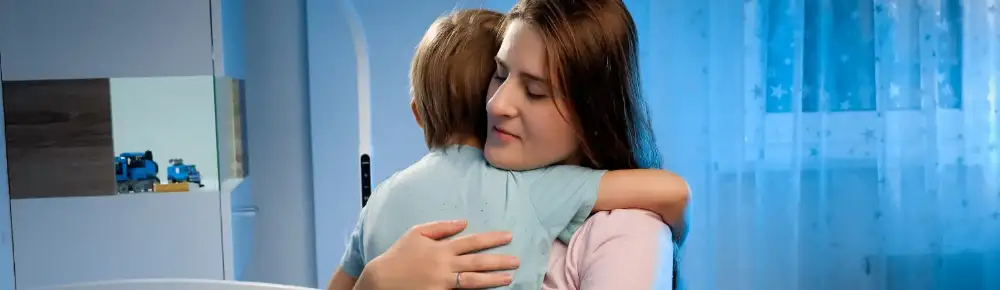 Mother hugging her child