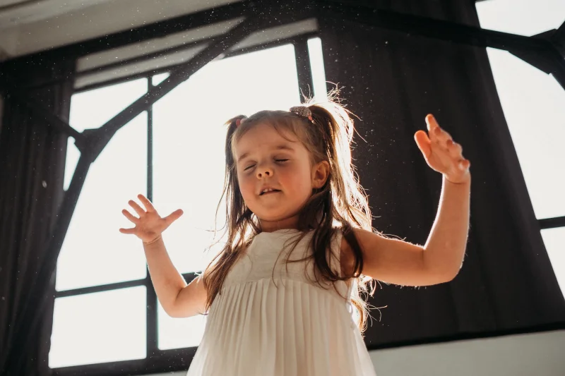 Child dancing to music
