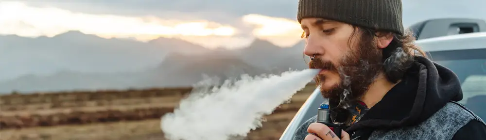 Man using vape pen